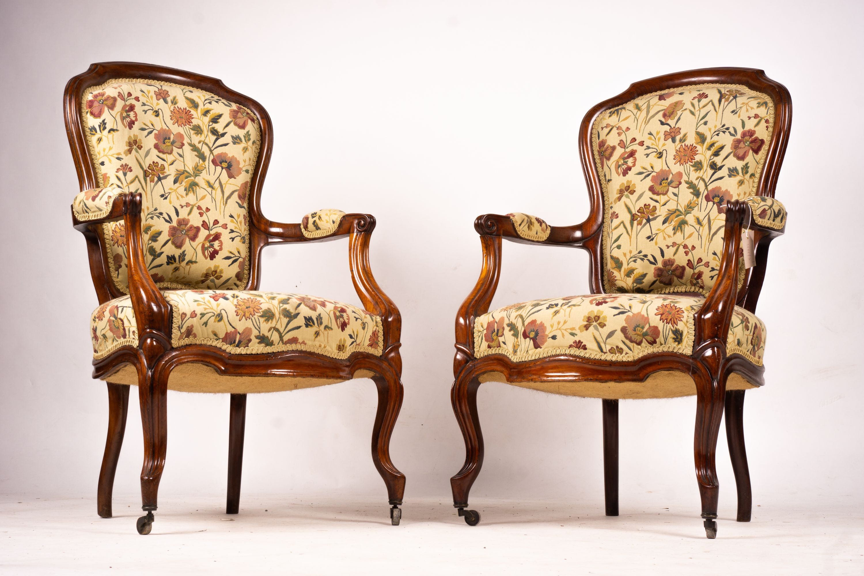 A pair of French mahogany framed open armchairs, width 60cm, depth 50cm, height 100cm